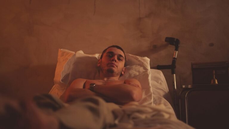 a person lying in a bed